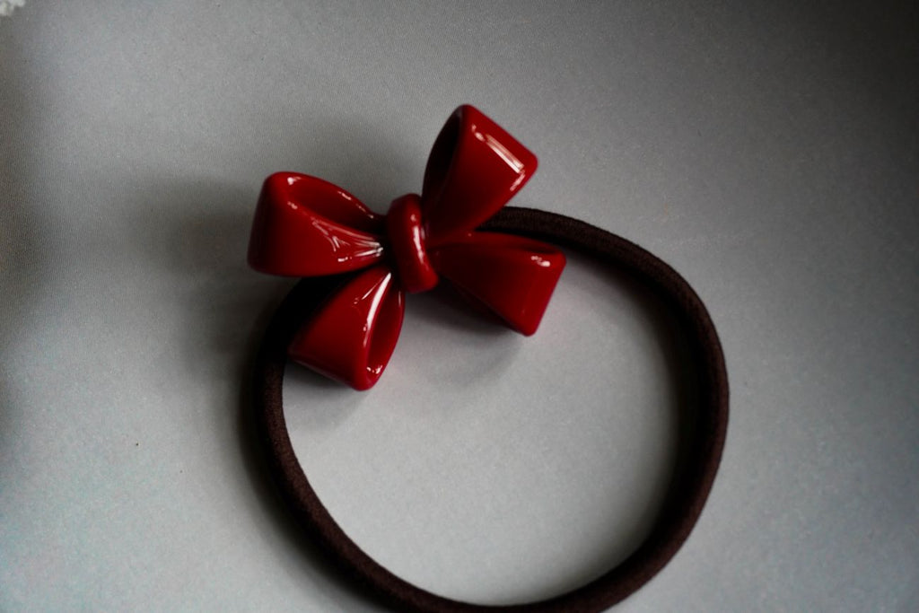 Hairband for girls and women with red bow tie
