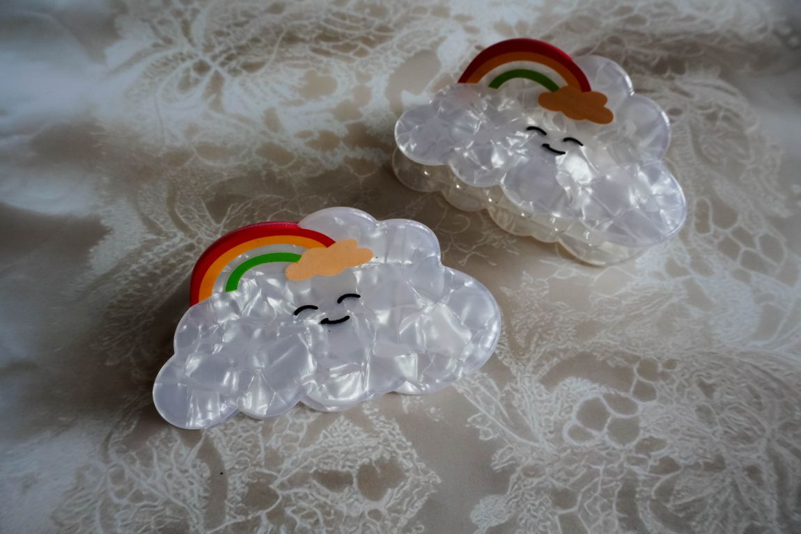 The smiling cloud with rainbow