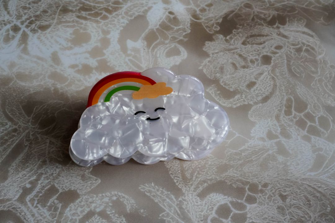 The smiling cloud with rainbow