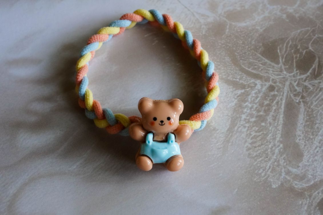the cartoon cute teddy hair band