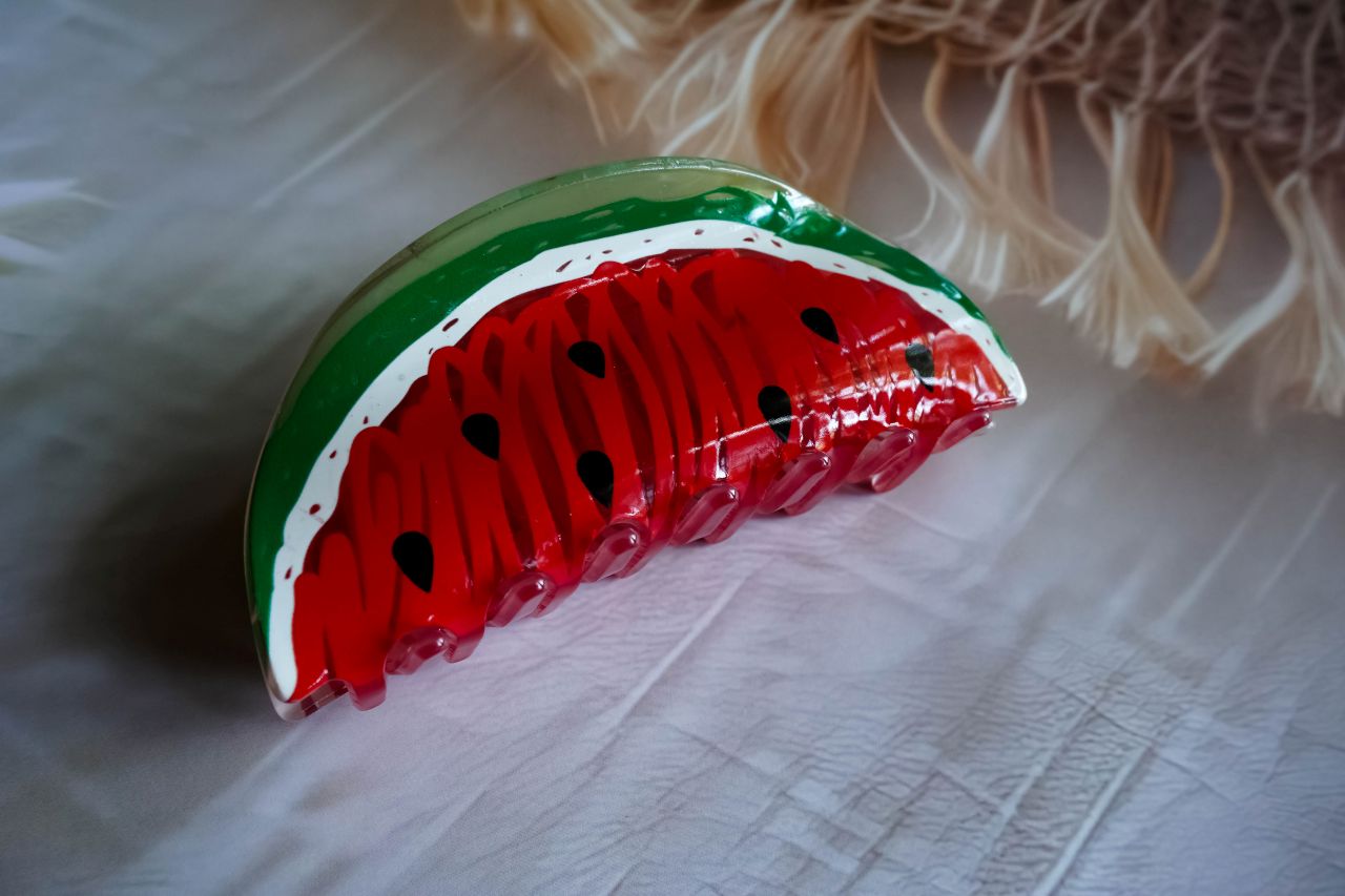 The large, beautiful watermelon claw clip.