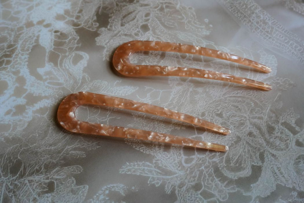 The orange minimalist style hair stick