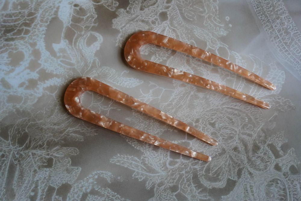 The orange minimalist style hair stick