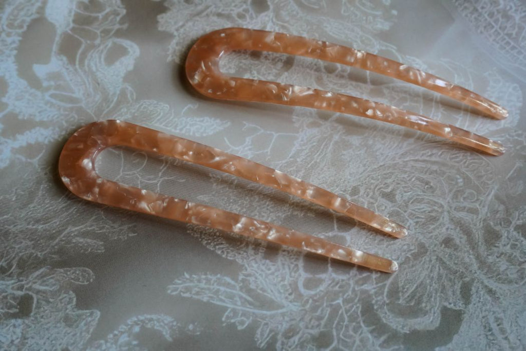 The orange minimalist style hair stick