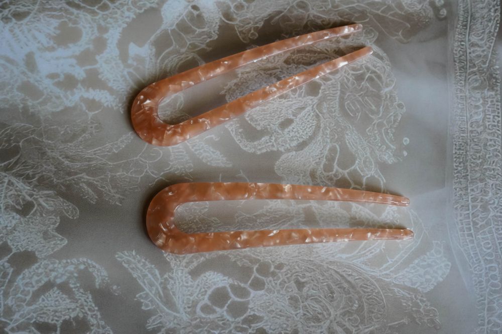 The orange minimalist style hair stick