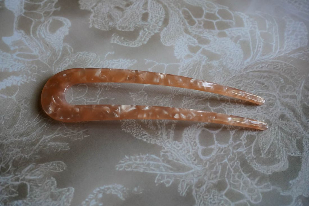 The orange minimalist style hair stick