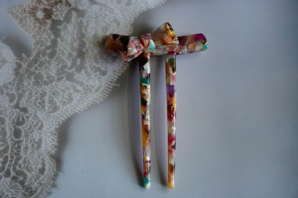 The magic rainbow hair stick